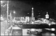 Iluminações de Natal e Fim de Ano no cais e na rua da Praia (atual avenida do Mar e das Comunidades Madeirenses), na passagem do ano de 1937 para 1938, Freguesia da Sé, Concelho do Funchal